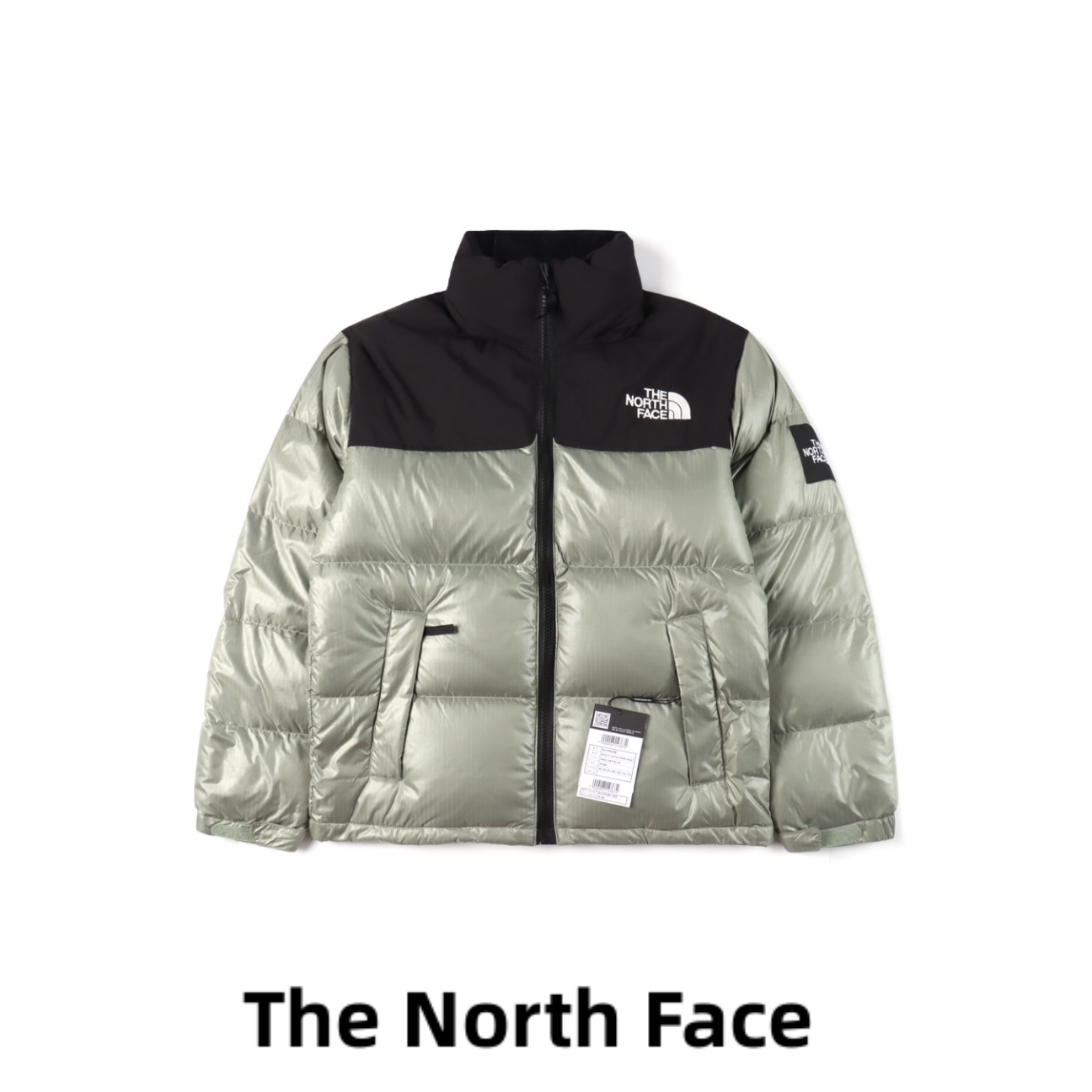 CX专供 独家纯原 羽绒服 【北面】 The North Face TNF 北面 23FW novelty nuptse 1996亮面袖标大格子羽绒服 ❶刺绣采用进口田岛绣花 万针刺绣,采用进口7号针,日本女皇绣线,保证每字饱满工、立体感清晰. ❷填充国标80鹅绒,保暖性能更出色,轻便不厚重,压缩后的蓬松度恢复性好! ❸原厂定制40D格子四级防水布料,内胆采用40T高密度胆布,防止跑绒,并保证手感及膨松度,内里采用尼龙nylon双重双层封禁设计,不会出现任何跑绒现象,内置抽拉绳扣的可调节下摆,可防风防寒! ❹拉链采用吉田YKK原厂定制,刻字清晰,质感完美顺滑.
