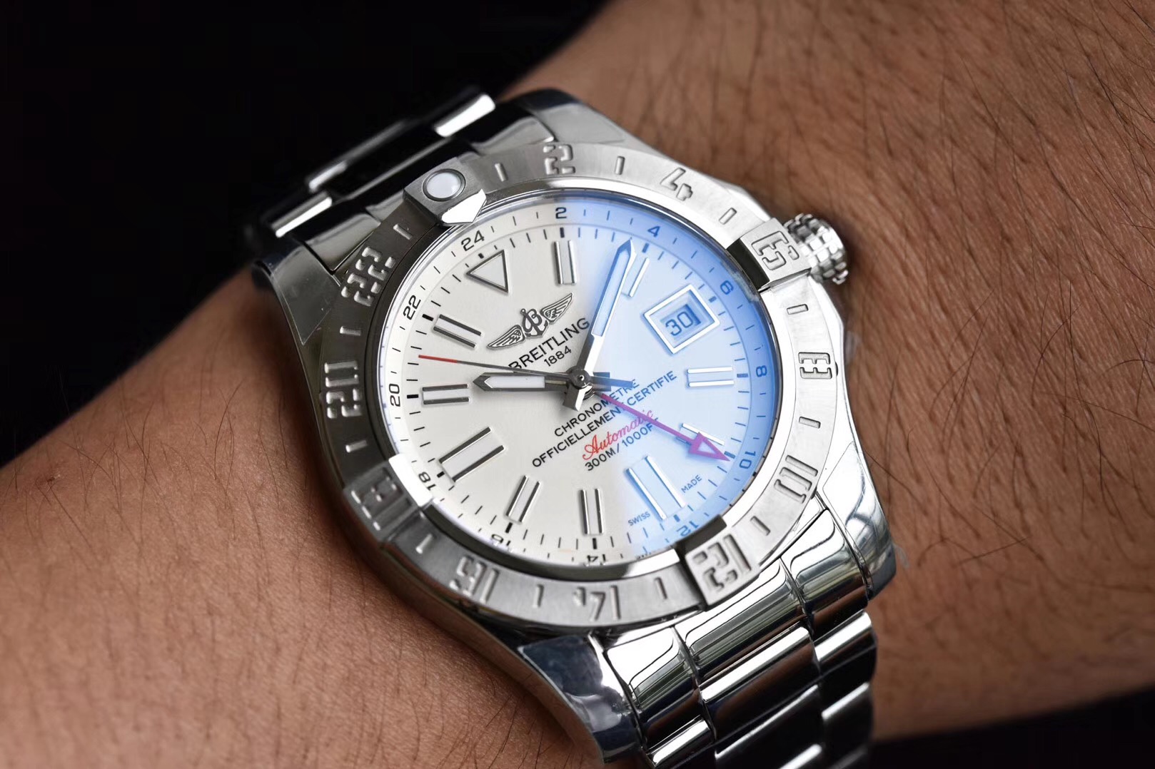 Wearing a replica Breitling watch