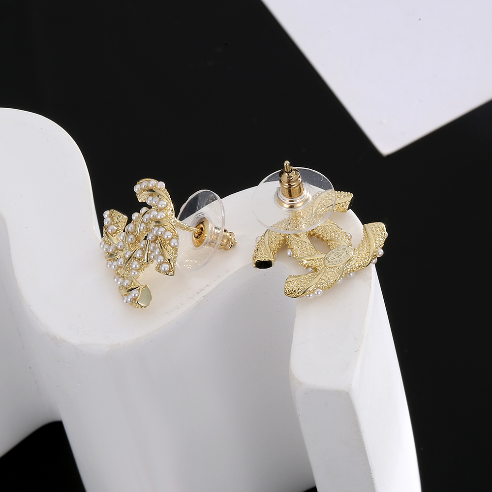 chanel gold braided cc stud earrings