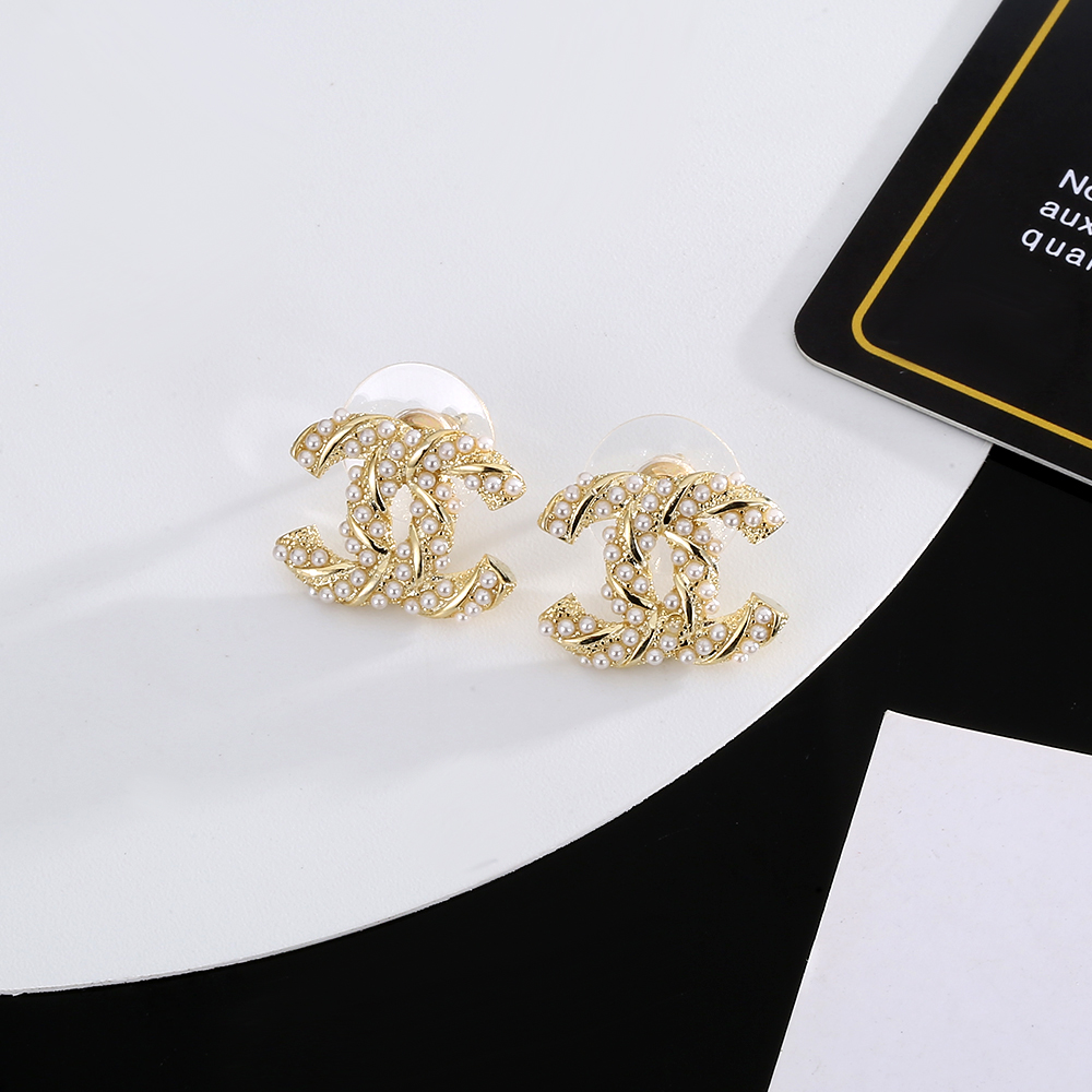 chanel gold braided cc stud earrings