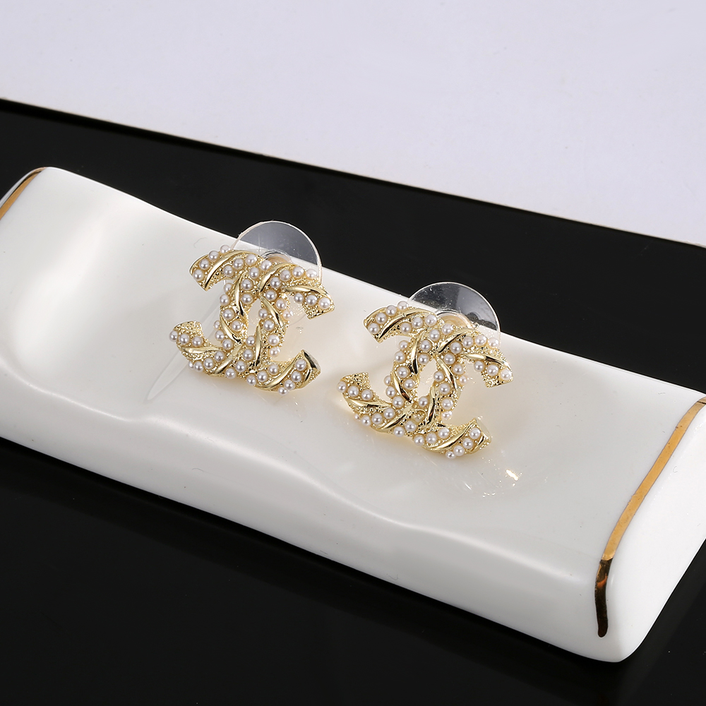 chanel gold braided cc stud earrings