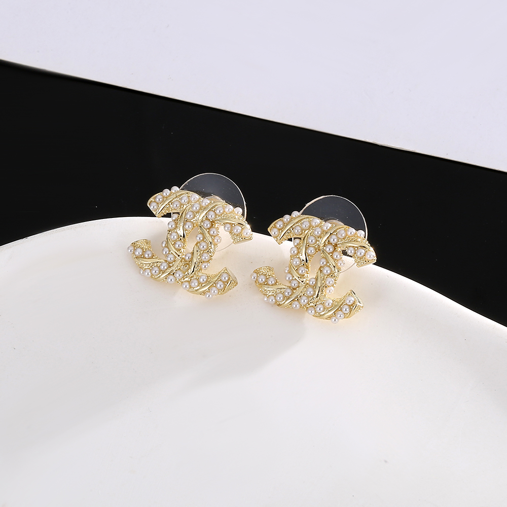 chanel gold braided cc stud earrings