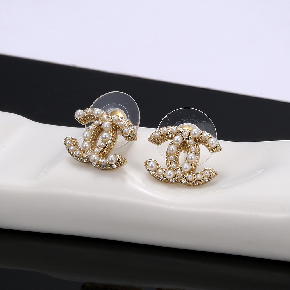 chanel gold crystal braided cc stud earrings