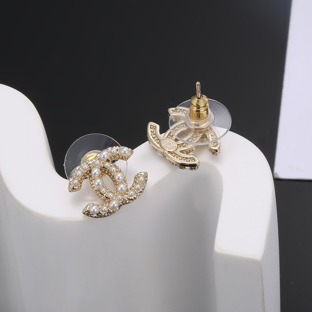 chanel gold crystal braided cc stud earrings