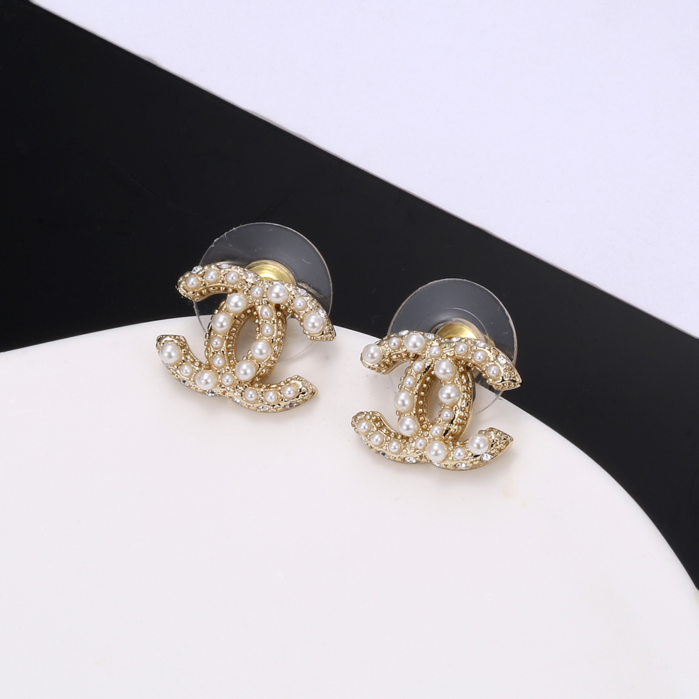 chanel gold crystal braided cc stud earrings