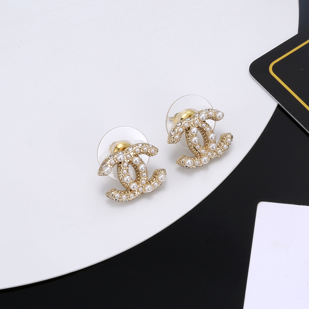 chanel gold crystal braided cc stud earrings