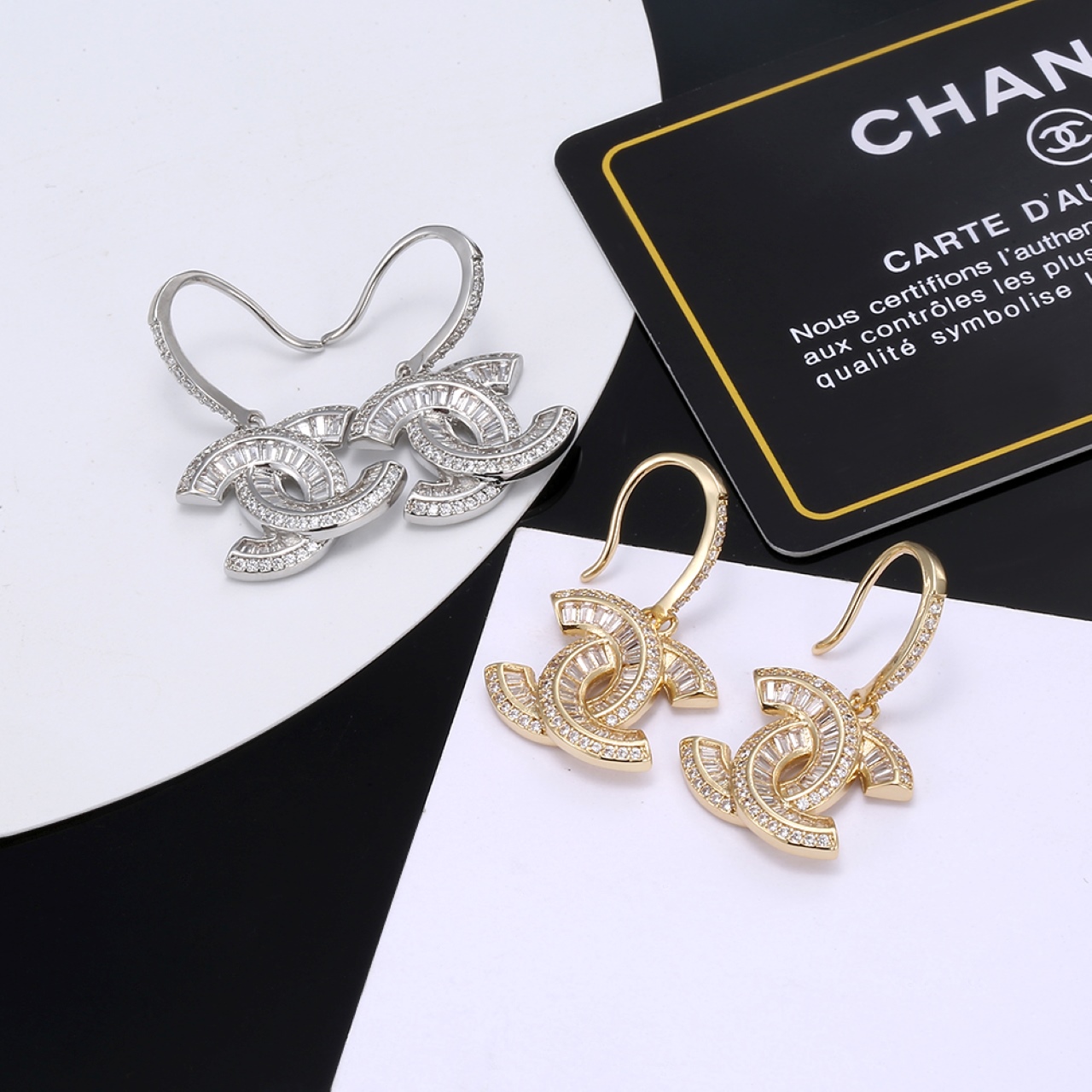 Chanel CC Baguette Crystal Drop Earrings earrings Gold-toned metal with clear baguette and round-cut crystals 2 5cm total drop length