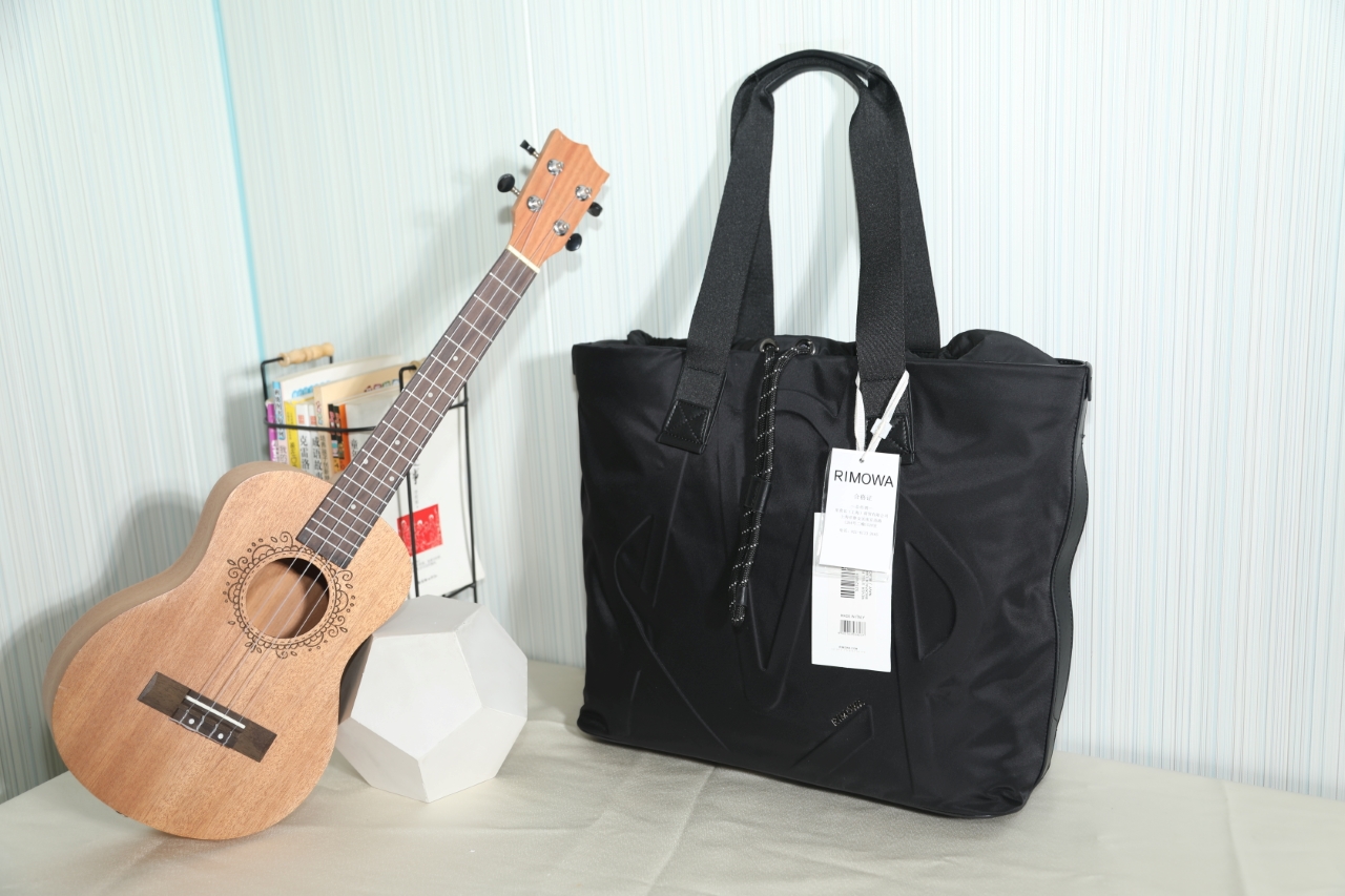 Bolso de mano con cordón Rimowa