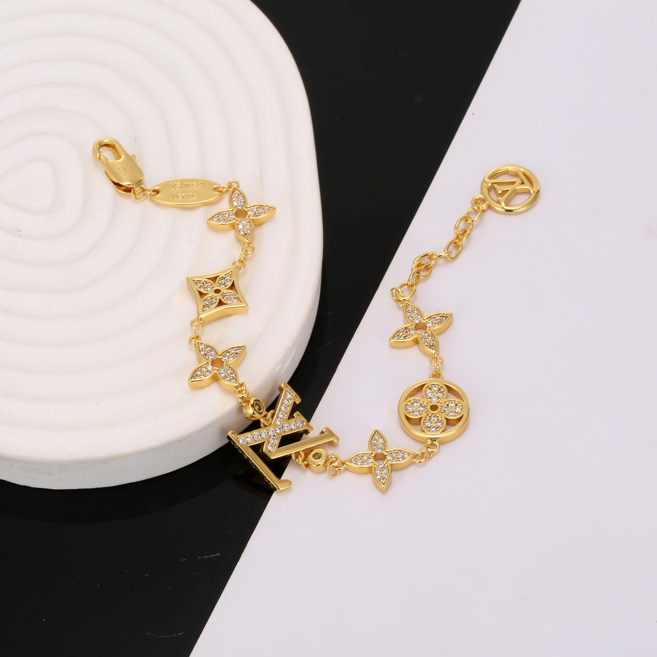 louis vuitton gold monogram charm bracelet
