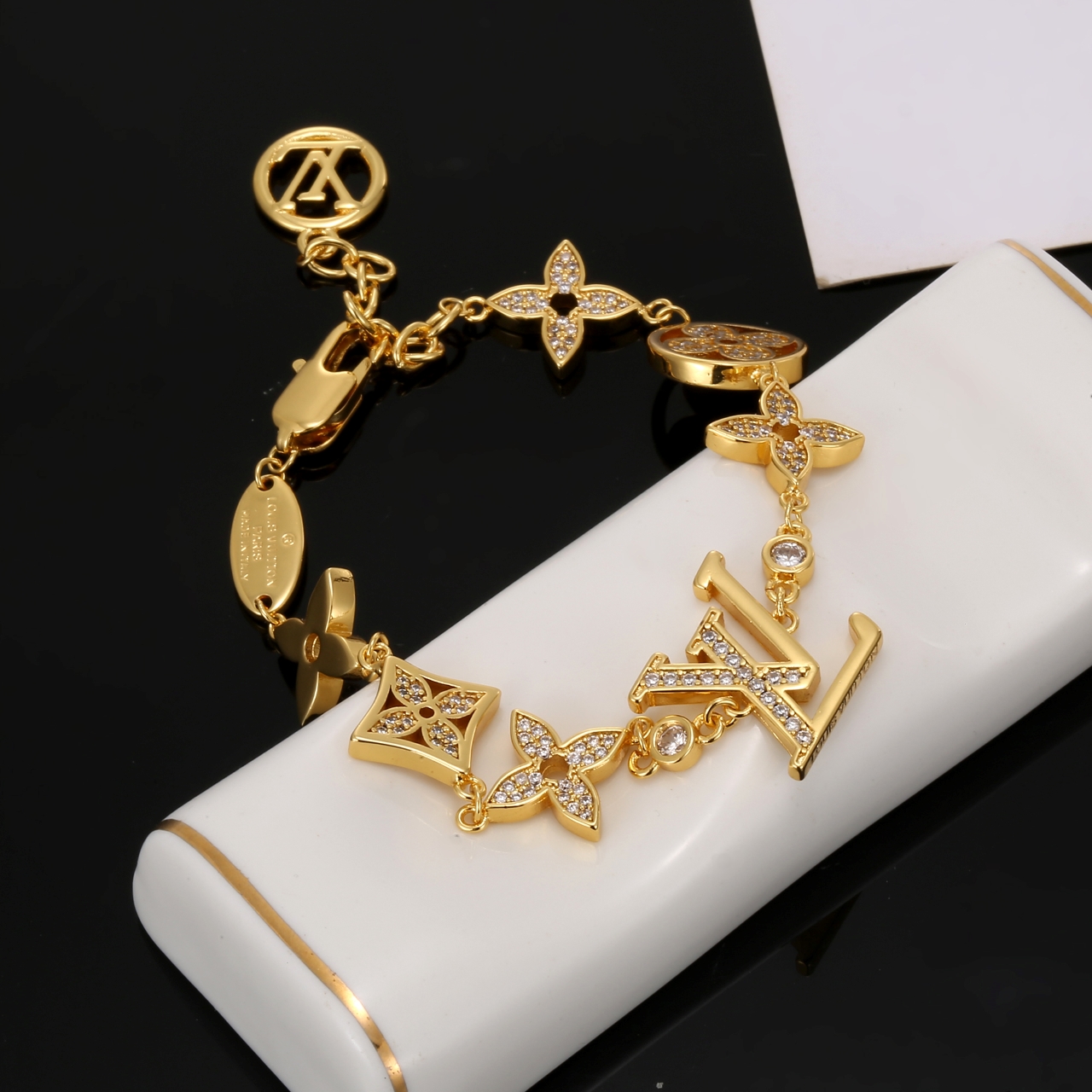 louis vuitton gold monogram charm bracelet