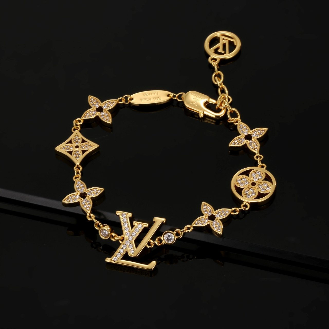 louis vuitton gold monogram charm bracelet