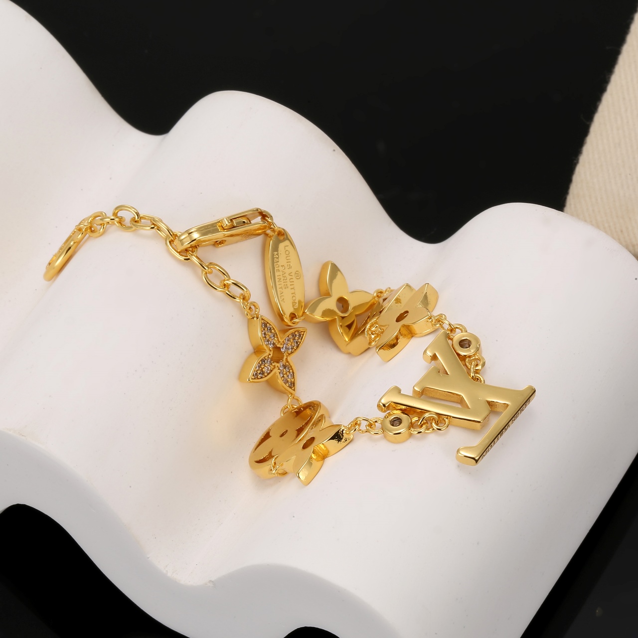 louis vuitton gold monogram charm bracelet
