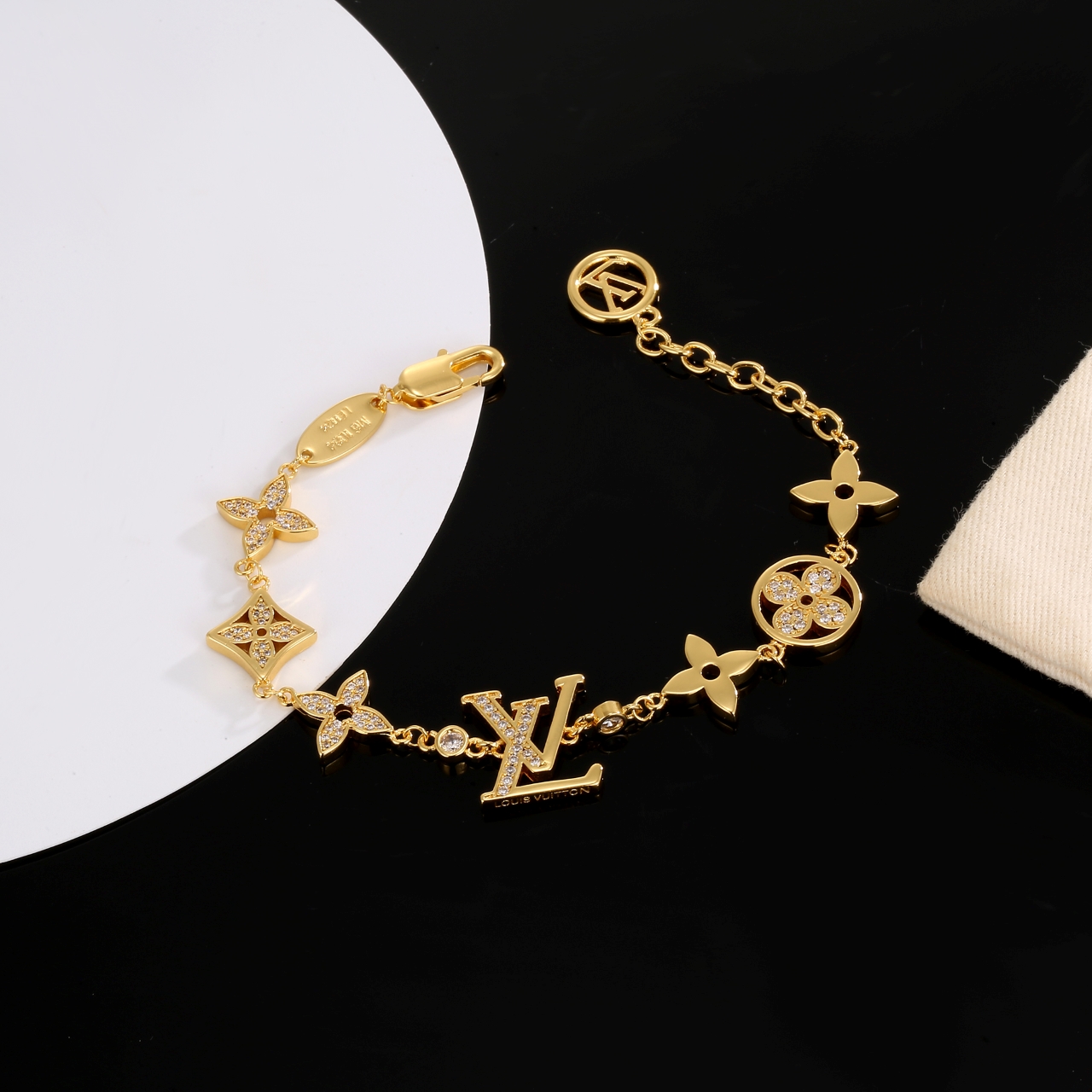 louis vuitton gold monogram charm bracelet