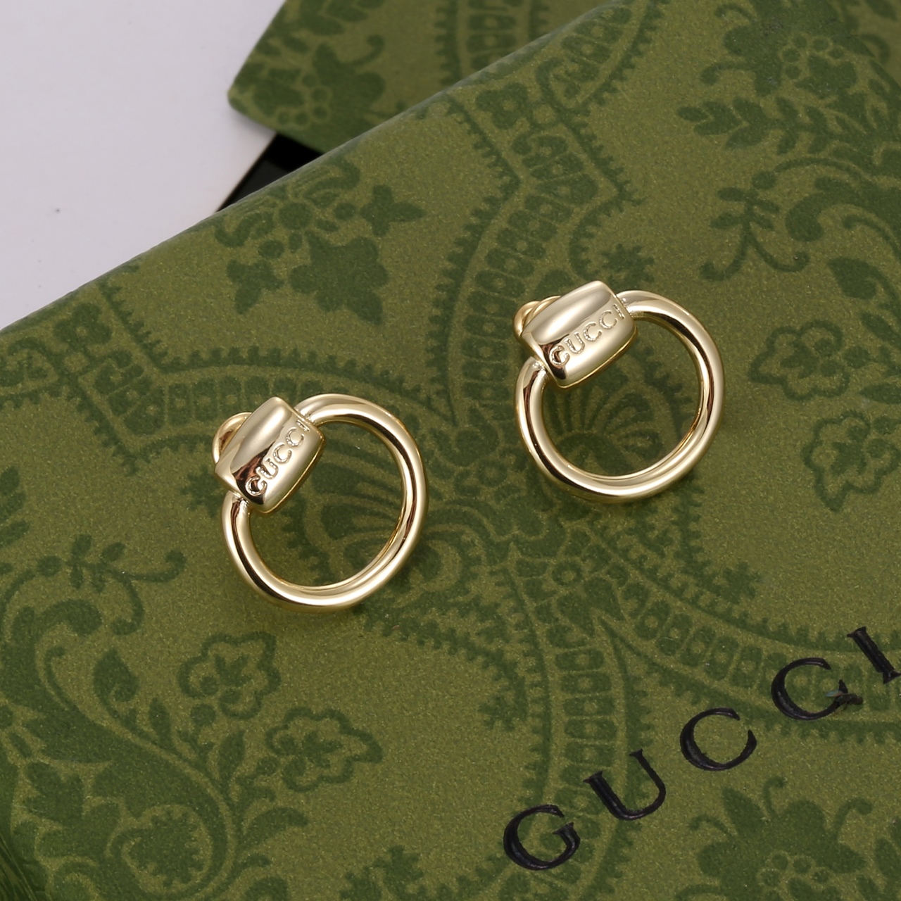 Las compras en línea
 Gucci Diseñador
 Joyas Pendiente