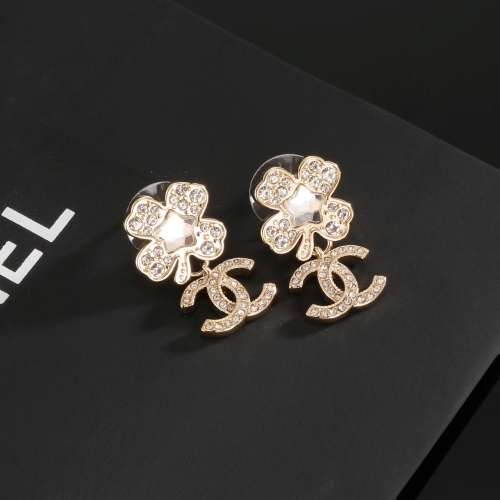 Chanel Clover Earrings with Gold Metal Trim and Crystal Accents - Elegant Design 1 Chanel Clover Earrings with Gold Metal Trim and Crystal Accents – Elegant Design