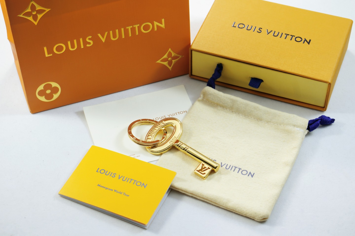 Gold chromatic keychain with letter charm