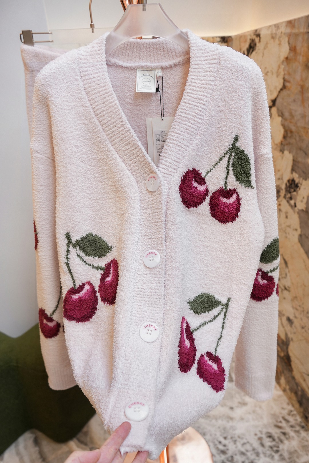 V-neck cardigan silhouette with a clean, refined design - Comprehensive 2