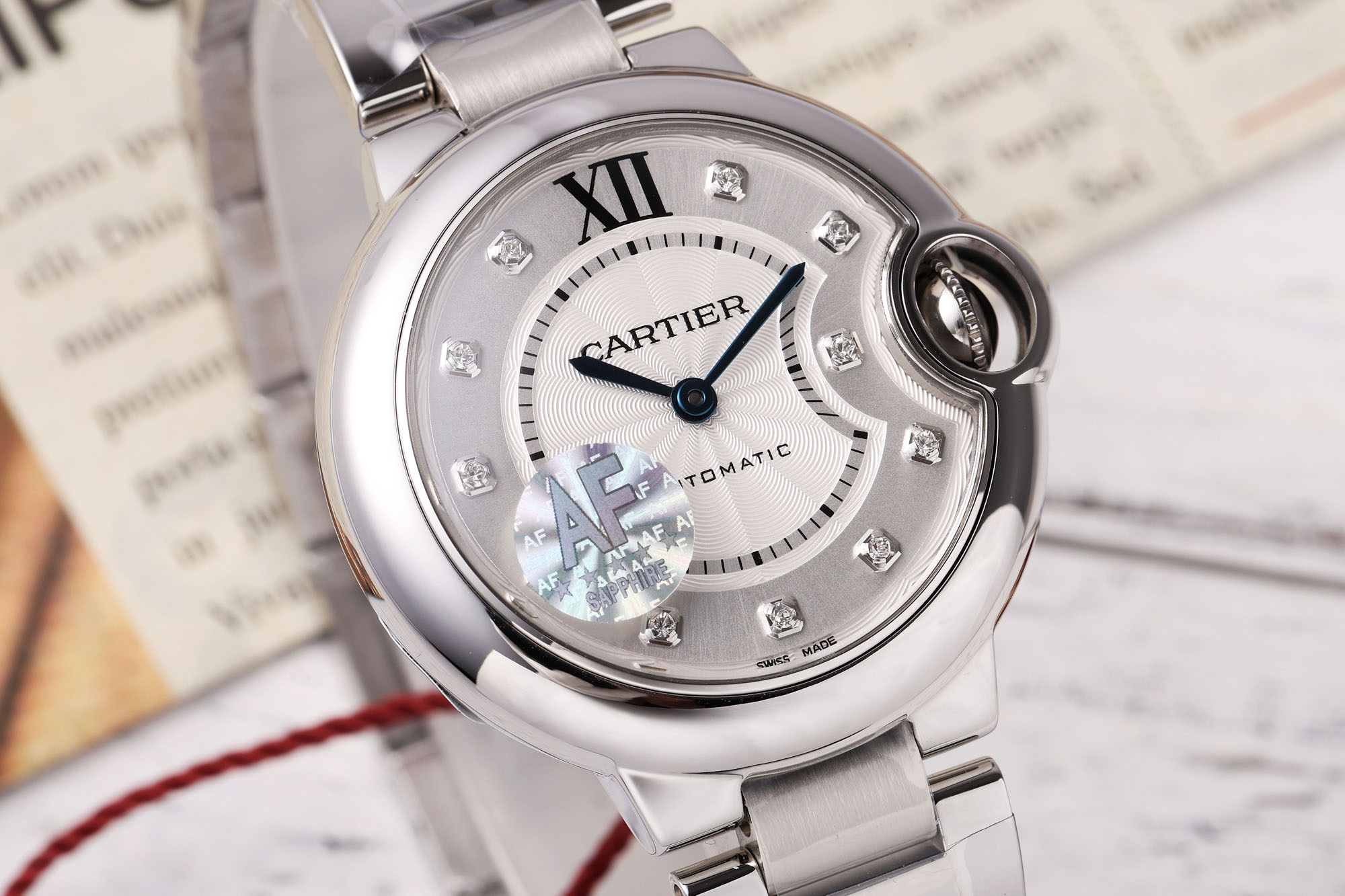 Title: AF Cartier 33mm Blue Balloon Watch Summary Summary: High-quality replica watch with 33mm diameter, steel surface, blue crystal, and Swiss craftsmanship.