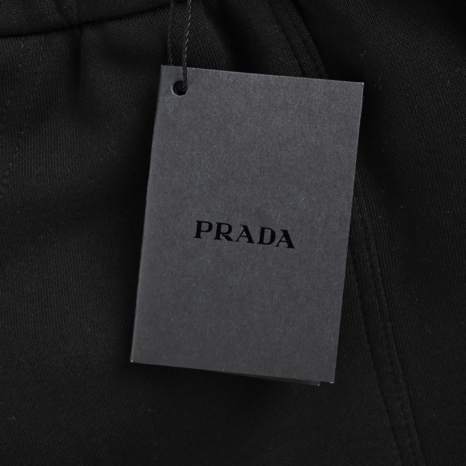Prada /普拉达 24Fw 口袋字母logo裤脚红色饰条长裤